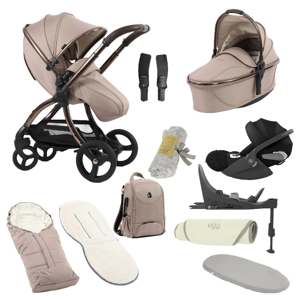 Egg shnuggle bundle in houndstooth almond colourway with cybex cloud t car seat and base.