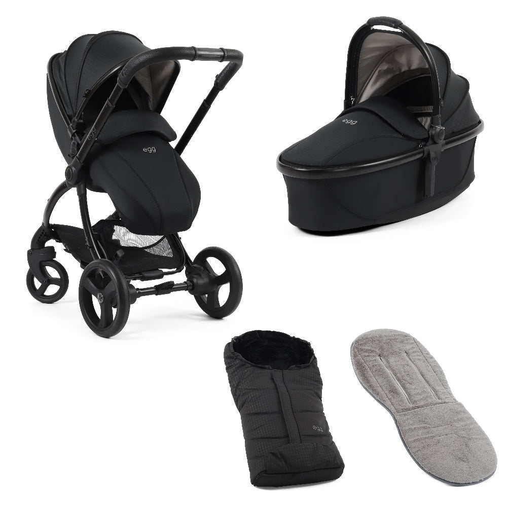 Egg 3 stroller in Houndstooth black including carrycot, footmuff and grey fleece liner.