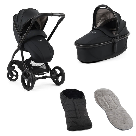 Egg 3 stroller in Houndstooth black including carrycot, footmuff and grey fleece liner.