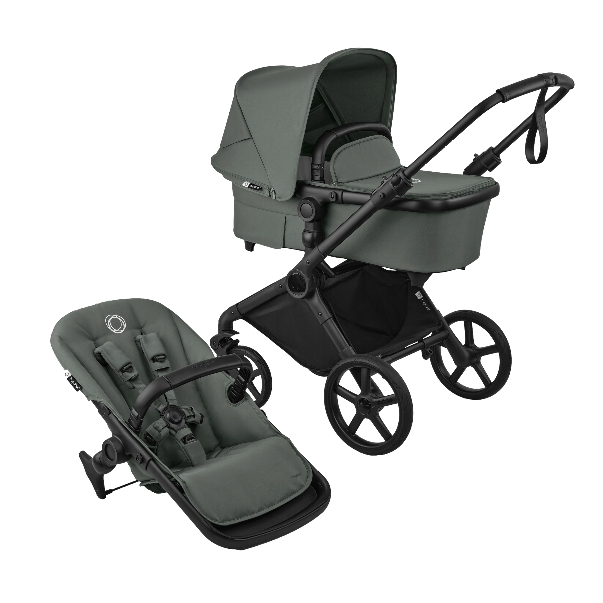 Cub pushchair in forest green with matching accessories.