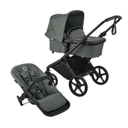 Cub pushchair in forest green with matching accessories.