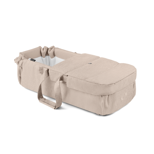 Bugaboo baby nest in desert taupe colourway to fit inside various pushchairs.