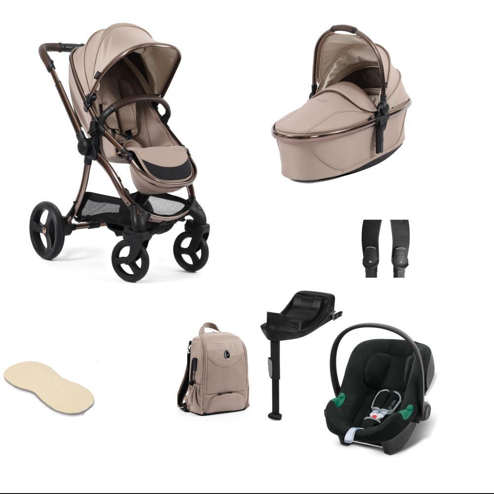 Egg 3 stroller in houndstooth almond including an aton b2 car seat and base with bag.