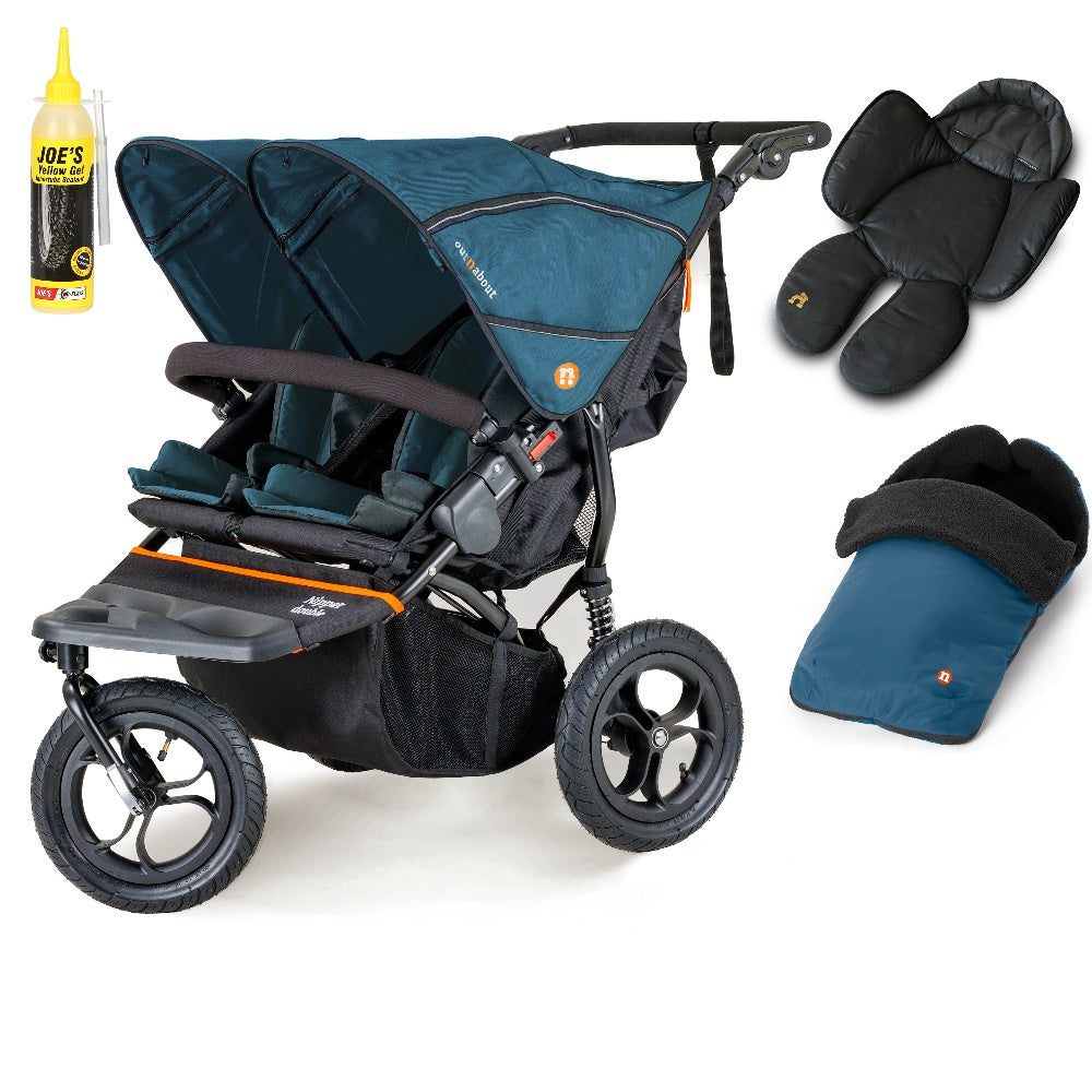 Out N About double nipper in highland blue with 1 footmuff and 1 newborn insert.