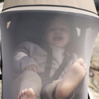 STOKKE YOYO insect net shown on a stroller with seat pack.