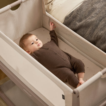 Snuzpod crib sheets in mocha brown with cross colour.