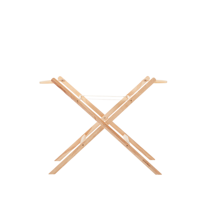 Little green sheep organic moses basket bundle in juniper green, including folding stand, sheets and mattress protector.