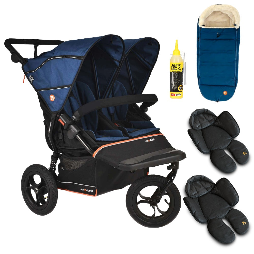Out N About double nipper v6  in highland blue with 1 footmuff and 2 newborn inserts.