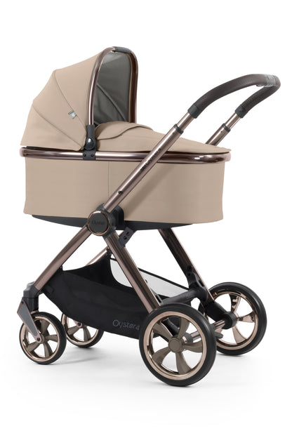 Oyster 4 Pushchair & carrycot in Fawn Beige, complete with all babies essential including car seat, crib, bath and bath time accessories.