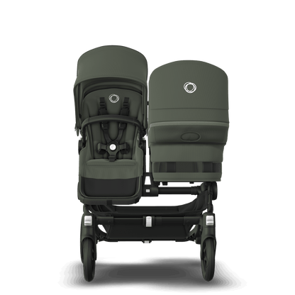 Forest Green Bugaboo Donkey 5 stroller with 2 x seat and1 x carrycot fabrics, designed for easy folding and adaptable for mono, duo or twin configurations.