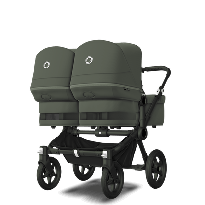 Forest Green Bugaboo Donkey 5 stroller with 2 x seat and 2 x carrycot fabrics, designed for easy folding and adaptable for mono, duo or twin configurations.