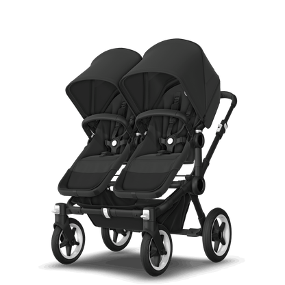 Midnight Black Bugaboo Donkey 5 stroller with 2 x seat and 2 x carrycot fabrics, designed for easy folding and adaptable for mono, duo or twin configurations.