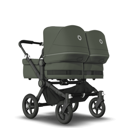 Forest Green Bugaboo Donkey 5 stroller with 2 x seat and 2 x carrycot fabrics, designed for easy folding and adaptable for mono, duo or twin configurations.