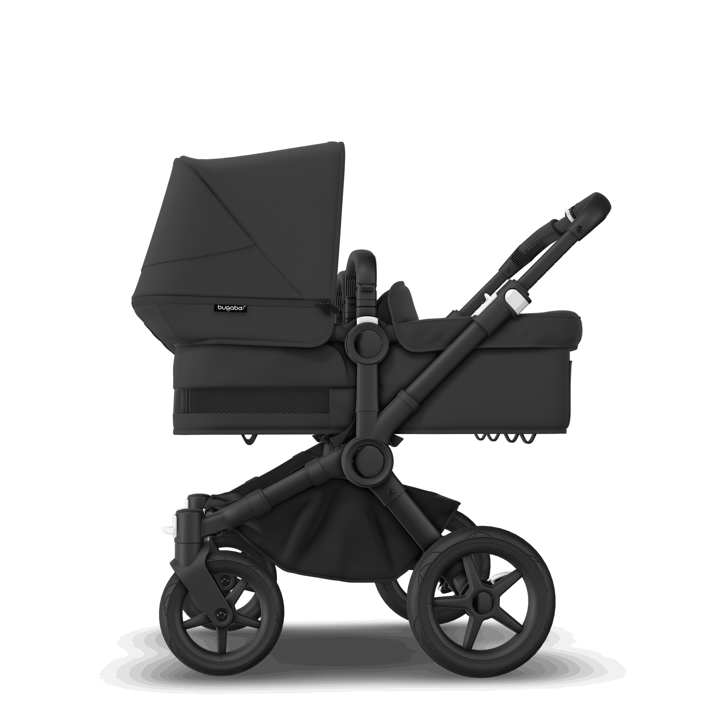 Midnight Black Bugaboo Donkey 5 stroller with 2 x seat and 2 x carrycot fabrics, designed for easy folding and adaptable for mono, duo or twin configurations.