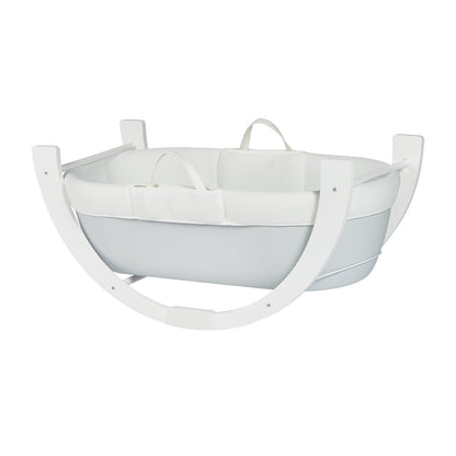 Dreamy moses basket in Grey resting on stand