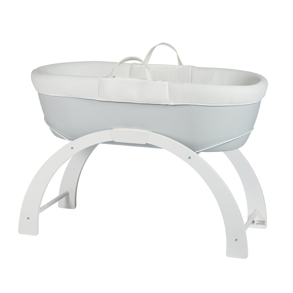 Dreamy moses basket in Grey resting on stand