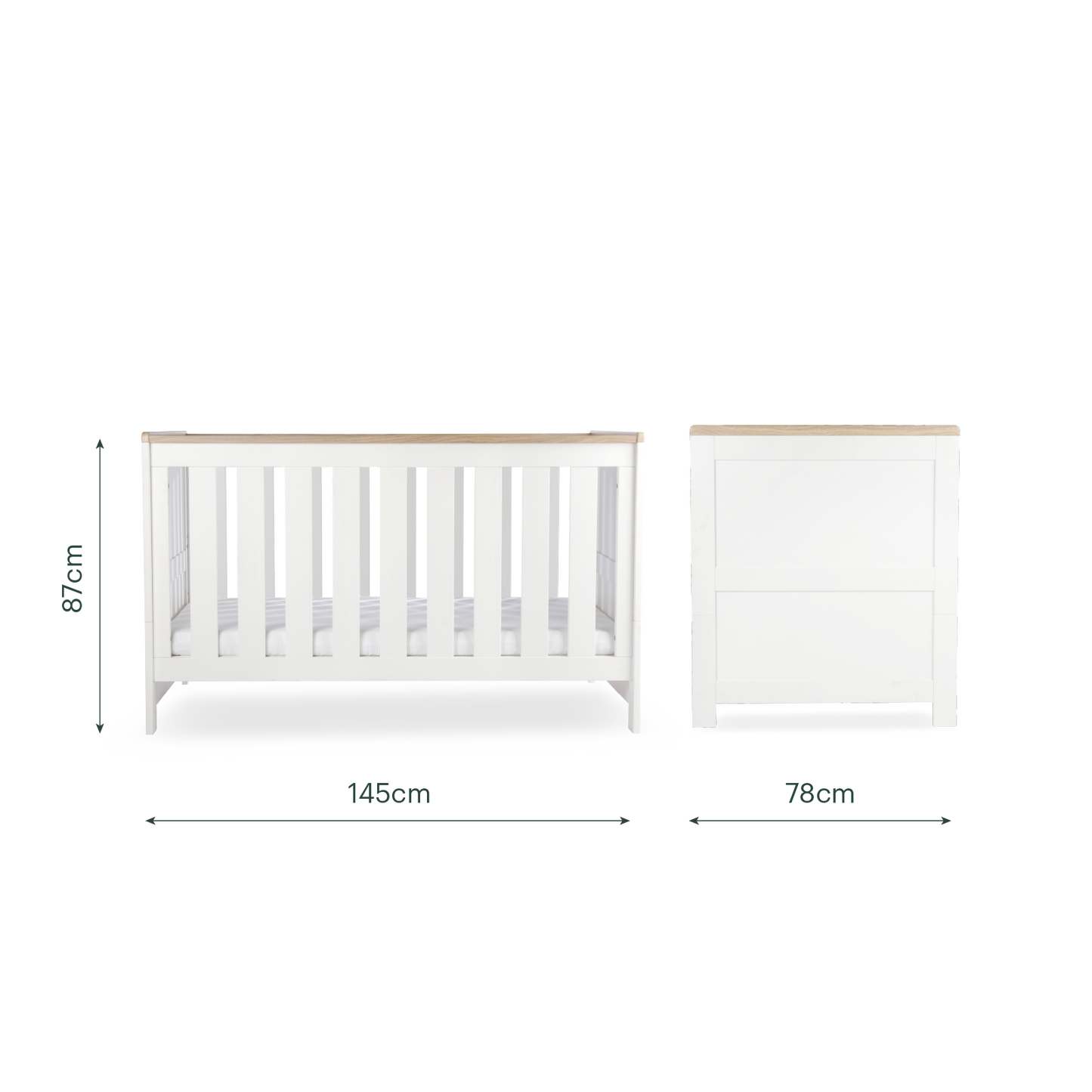 CuddleCo Burford cot bed in white with oak trim.