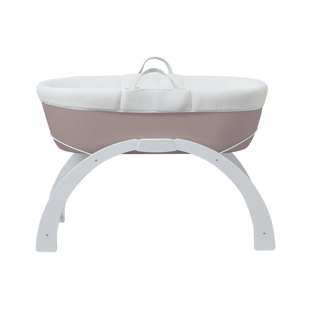 Dreamy moses basket in taupe resting on stand