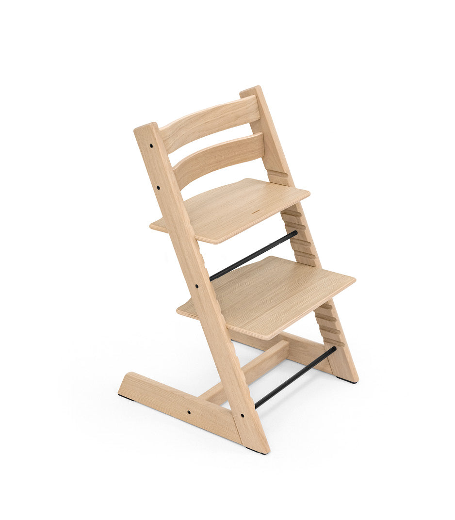 Tripp Trapp Wooden Frame high chair in oak natural colour.