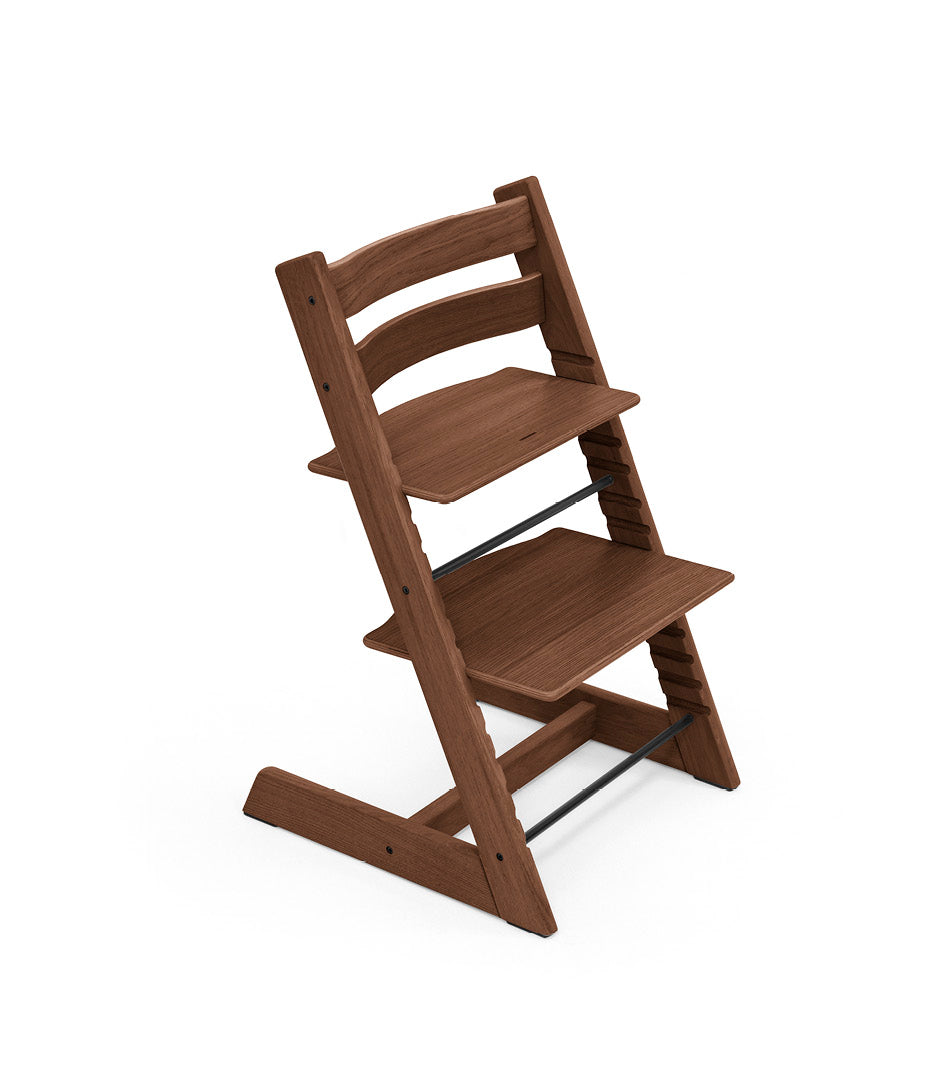 Tripp Trapp Wooden Frame high chair in oak warm brown colour.