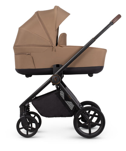 Venicci Claro in Caramel stroller, carrycot and accessories displayed, highlighting a 2-in-1 travel system with mesh ventilation and one-hand folding capability.