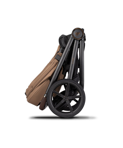 Venicci Claro in Caramel stroller, carrycot and accessories displayed, highlighting a 2-in-1 travel system with mesh ventilation and one-hand folding capability.