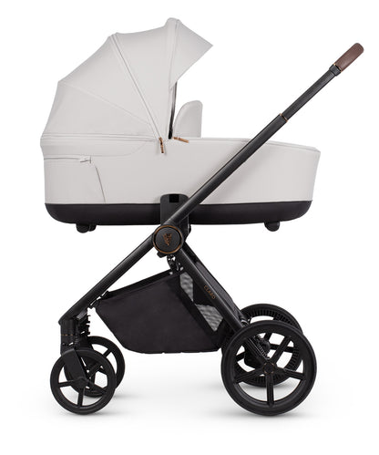 Venicci Claro in Vanilla stroller, carrycot and accessories displayed, highlighting a 2-in-1 travel system with mesh ventilation and one-hand folding capability.