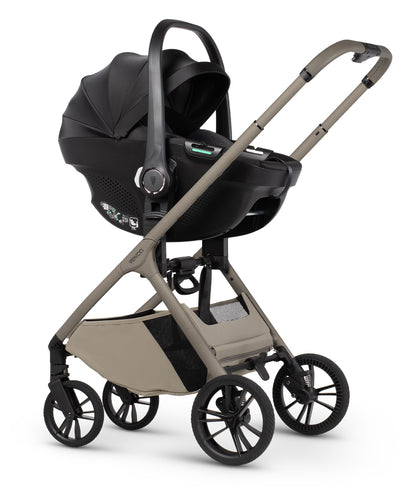 Tila 13 piece pram bundle with tiago car seat, isofix base and accessories in latte colourway.