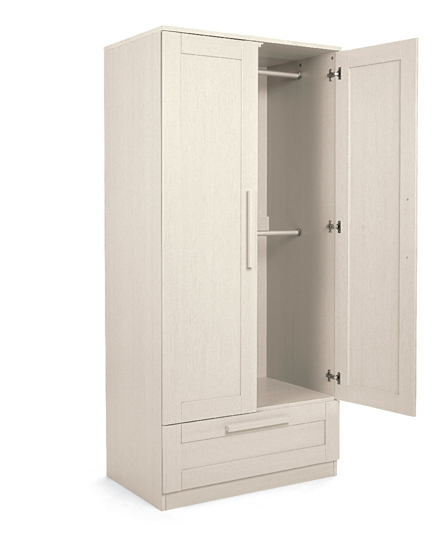 Cot bed, wardrobe and 3 drawer dresser set in stone colour.