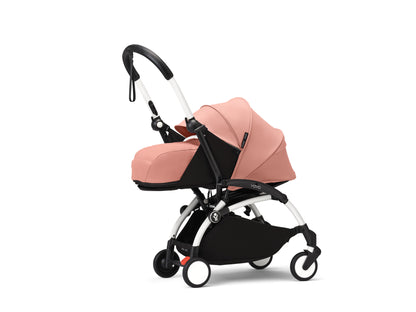 YoYo3 pushchair white chassis with ginger newborn pack and colour pack.