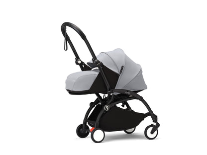 YoYo3 pushchair black chassis with stone newborn pack and colour pack.