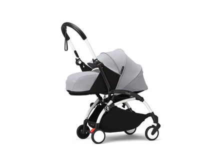 YoYo3 pushchair white chassis with stone newborn pack and colour pack.