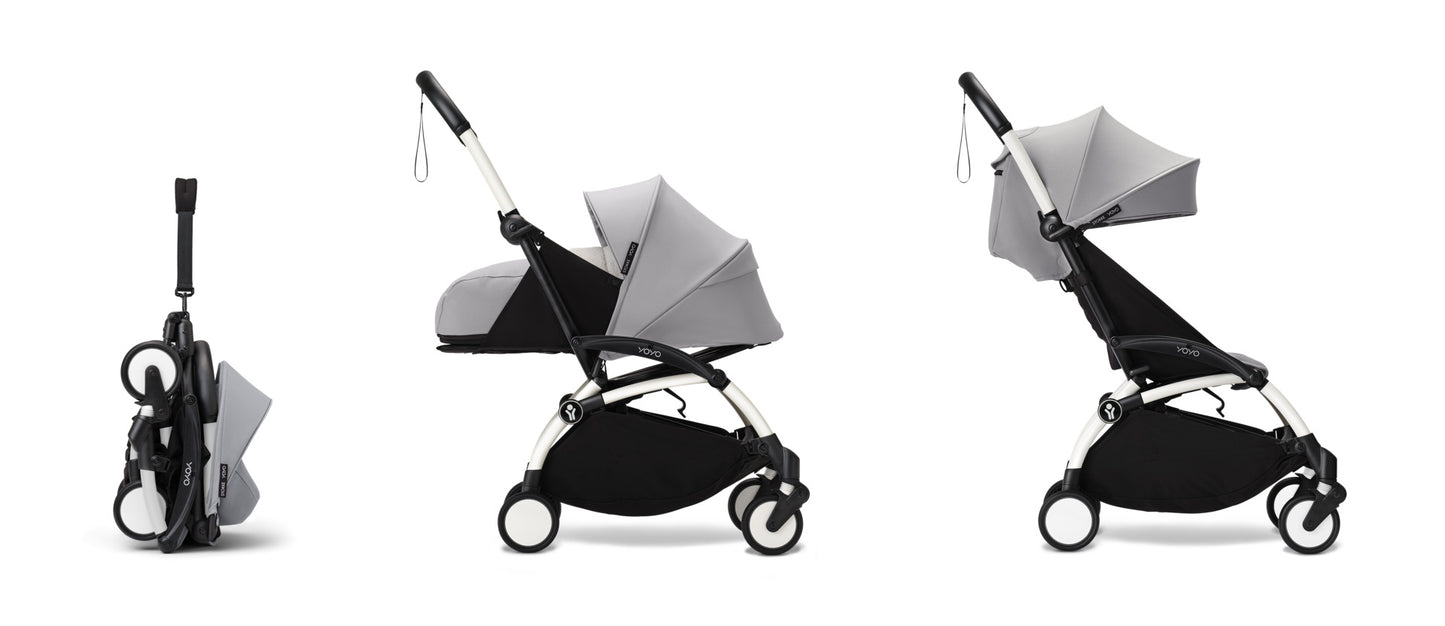 YoYo3 pushchair white chassis with stone newborn pack and colour pack.