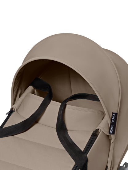 Stokke yoyo bassinet in taupe suitable for use with the yoyo stroller.