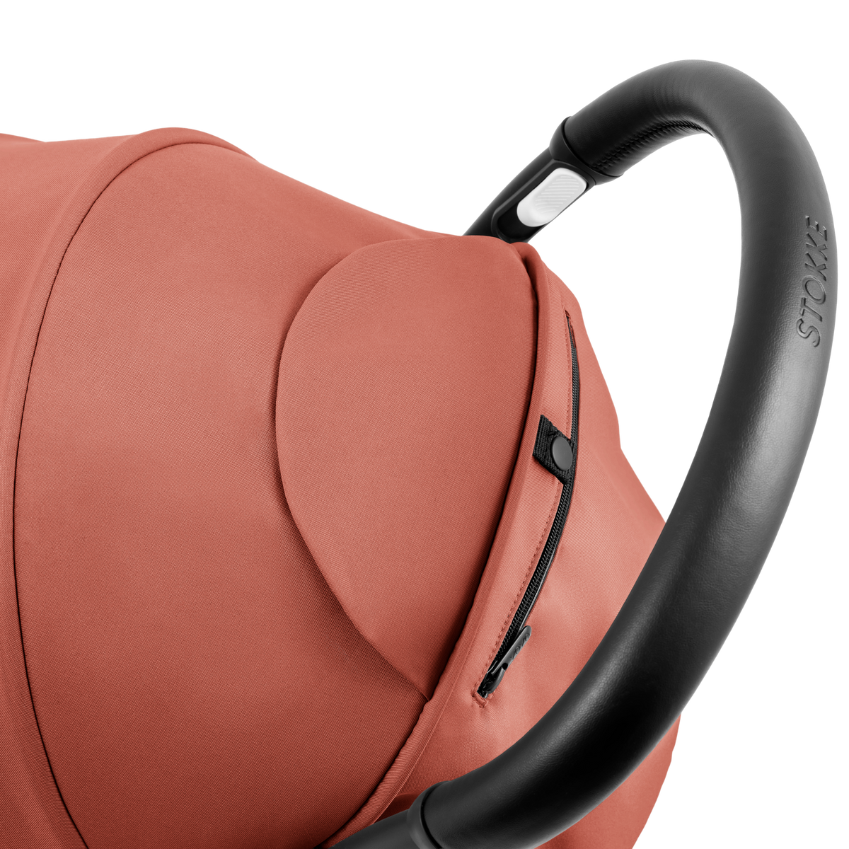 A compact yoyo 5 stroller with a rust-orange canopy and seat lining, a black frame, and black wheels, shown on a plain white background.