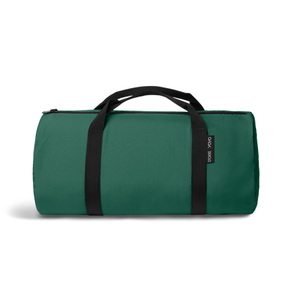 A stroller with a forest green colored padded footmuff, cream fleece lining, and a black frame, shown from the front on a white background.