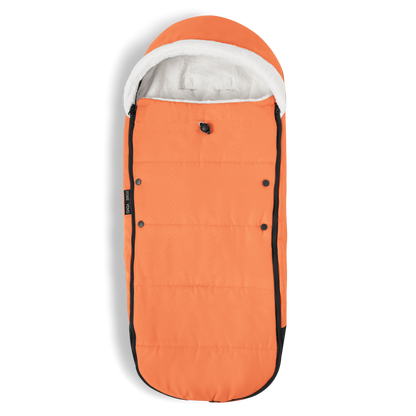 A stroller with a orange colored padded footmuff, cream fleece lining, and a black frame, shown from the front on a white background.