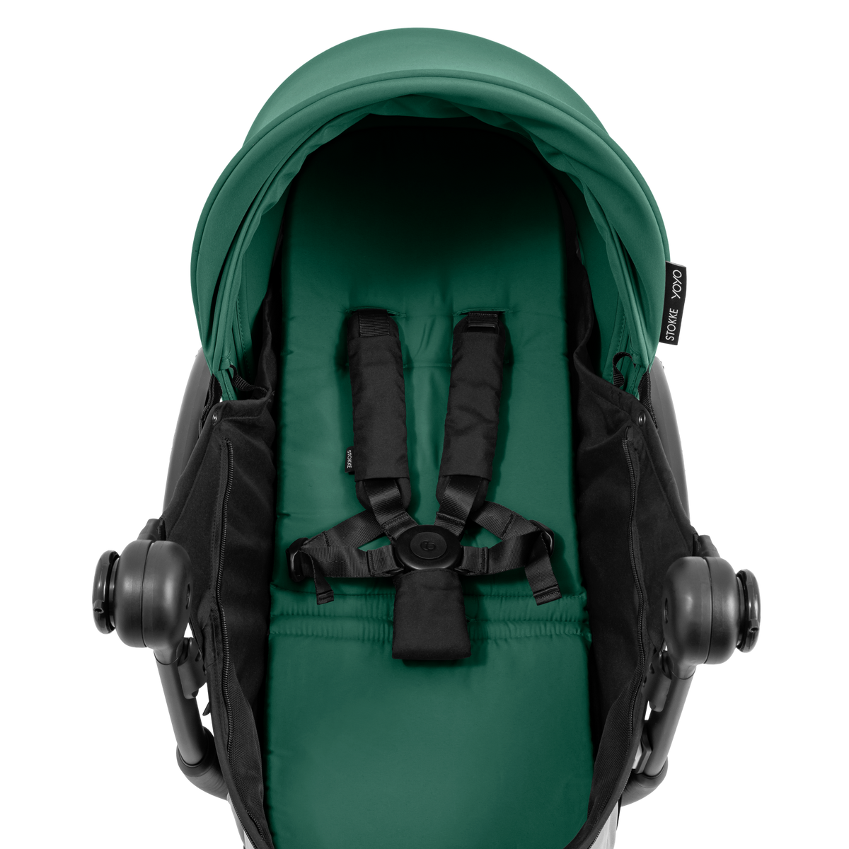 A yoyo stroller bassinet attachment set in dark green and black, shown mounted on a stroller frame against a solid white background.