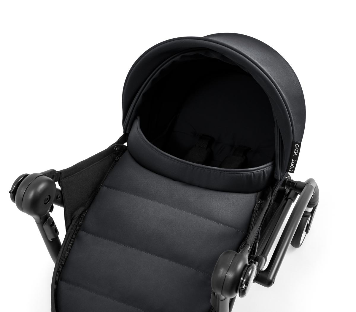 A yoyo stroller bassinet attachment set in black, shown mounted on a stroller frame against a solid white background.