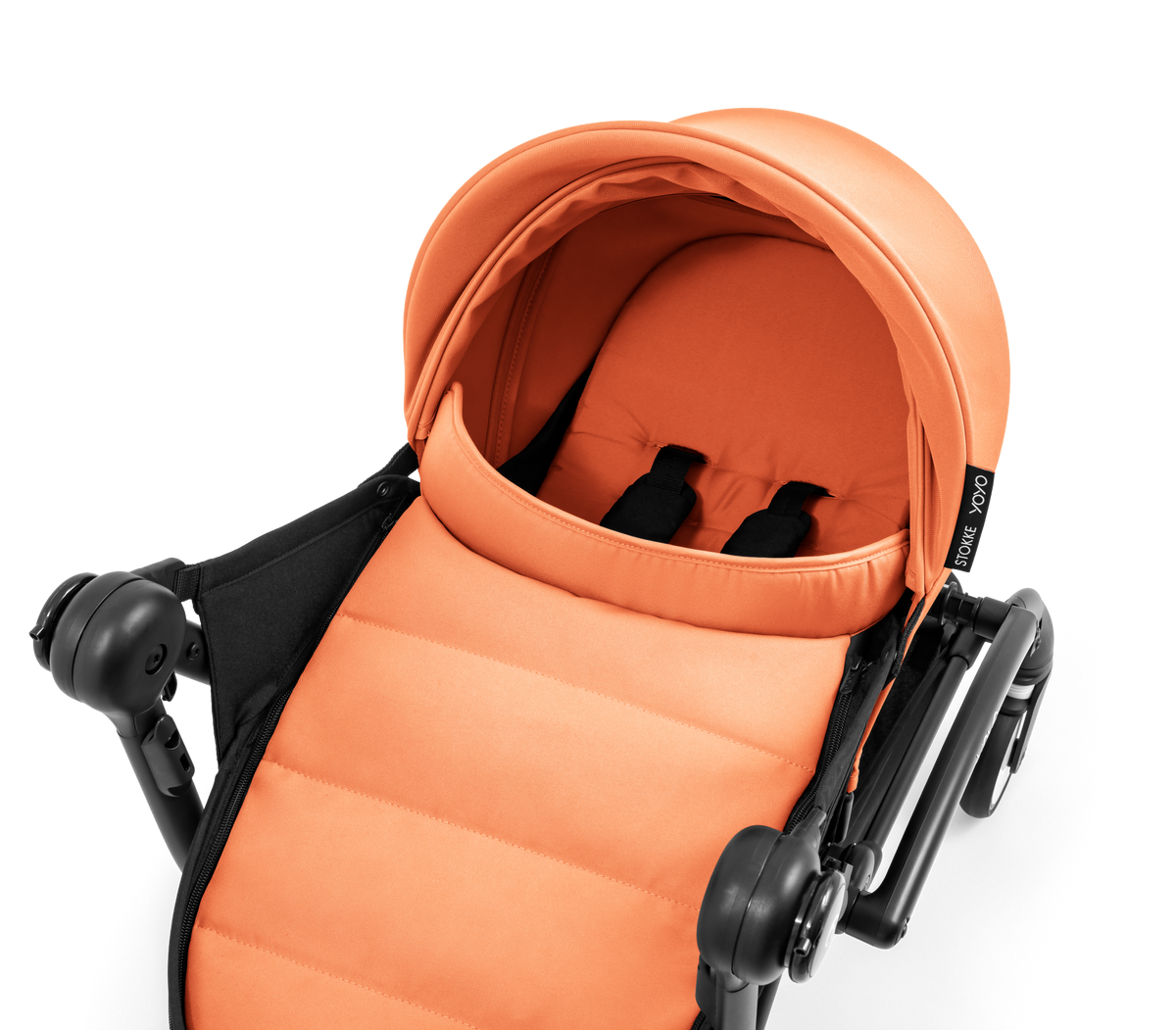 A yoyo stroller bassinet attachment set in orange and black, shown mounted on a stroller frame against a solid white background.