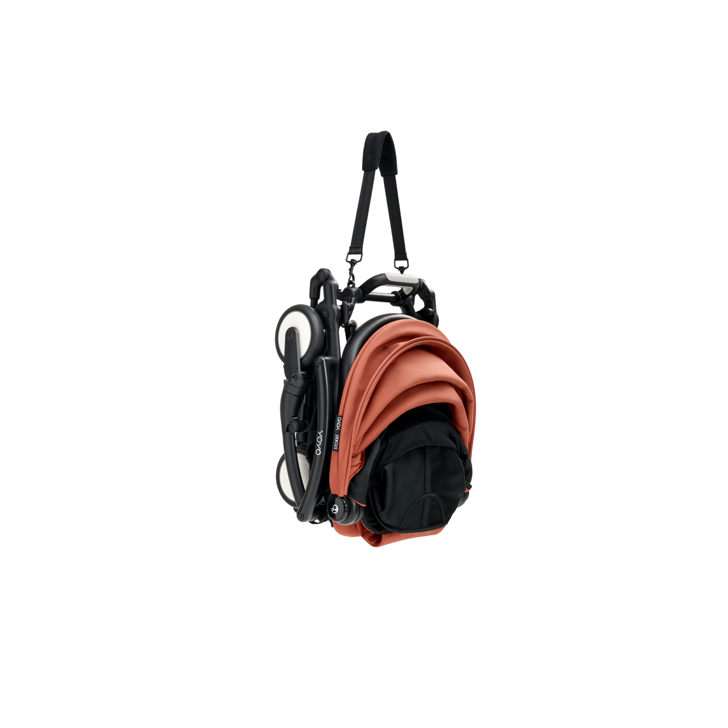 A compact yoyo 5 stroller with a rust-orange canopy and seat lining, a black frame, and black wheels, shown on a plain white background.