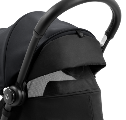 A compact yoyo 5 stroller with a black canopy and seat lining, a black frame, and black wheels, shown on a plain white background.