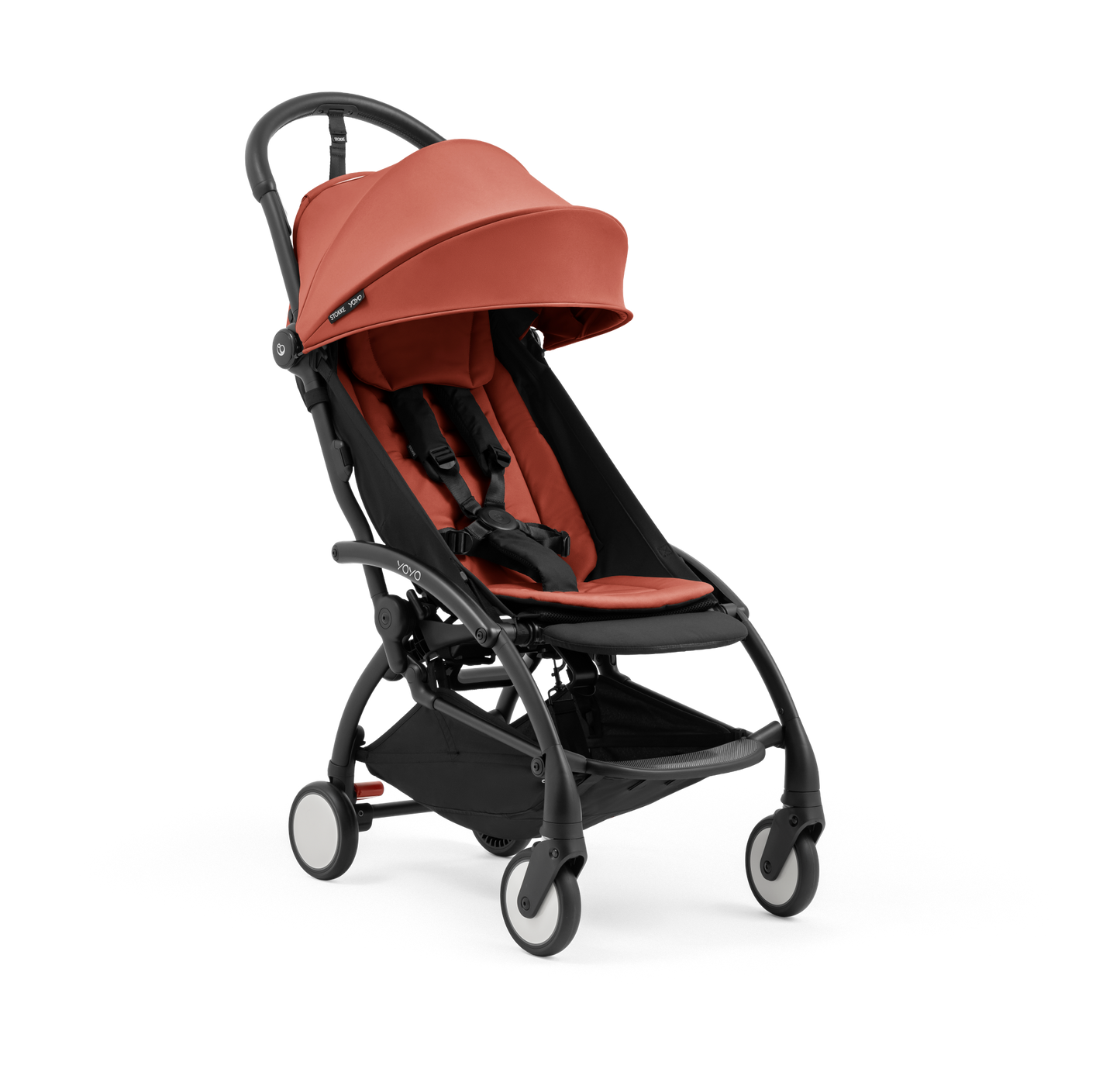 A compact yoyo 5 stroller with a rust-orange canopy and seat lining, a black frame, and black wheels, shown on a plain white background.