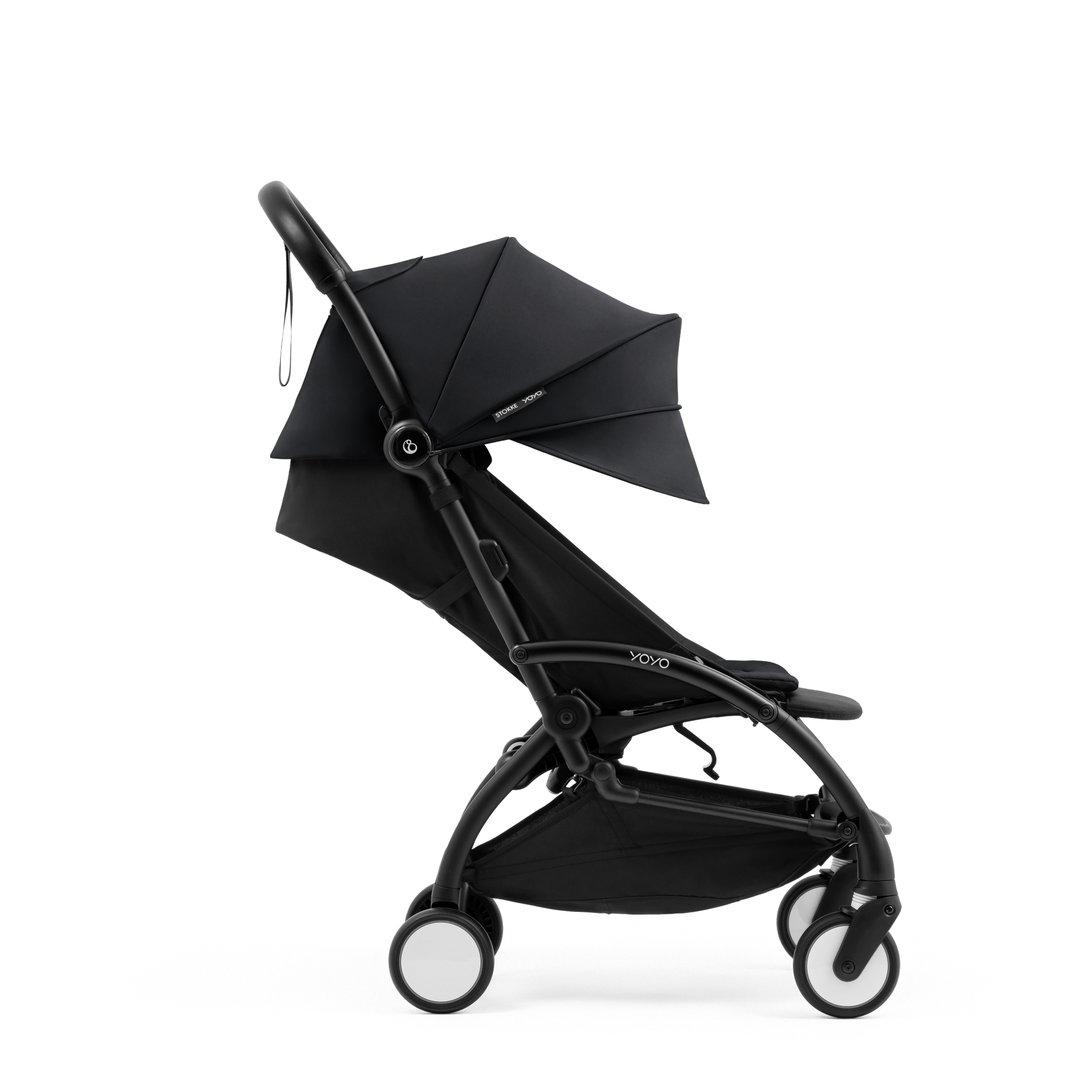 A compact yoyo 5 stroller with a black canopy and seat lining, a black frame, and black wheels, shown on a plain white background.