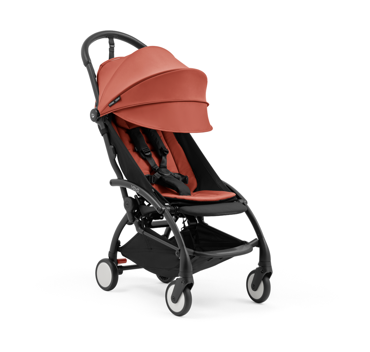 A compact yoyo 5 stroller with a rust-orange canopy and seat lining, a black frame, and black wheels, shown on a plain white background.