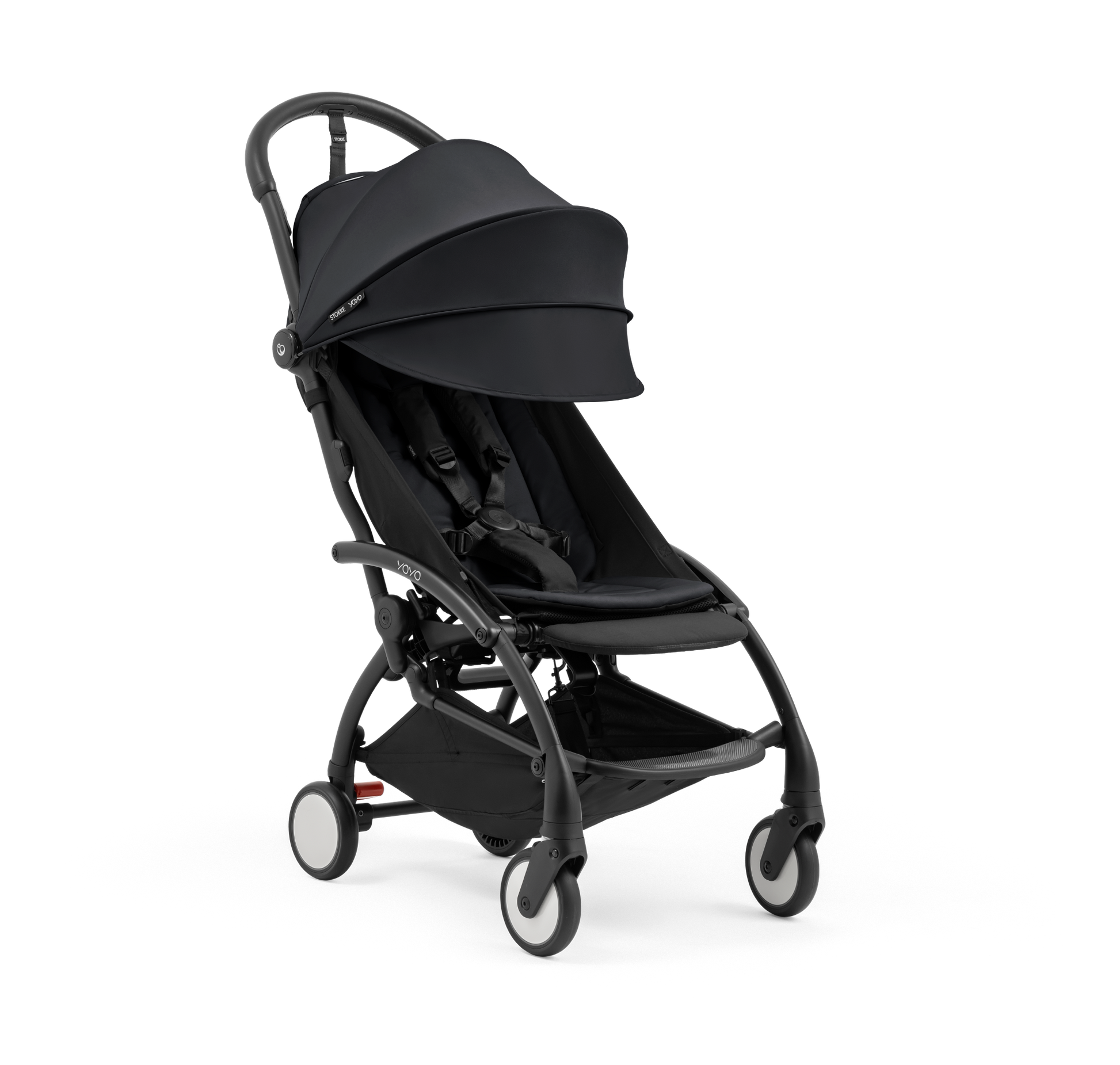 A compact baby stroller with a black canopy and black padded seat, with a blacked out chassis, shown on a plain white background.