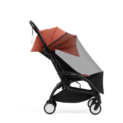 STOKKE YOYO insect net shown on a stroller with seat pack.
