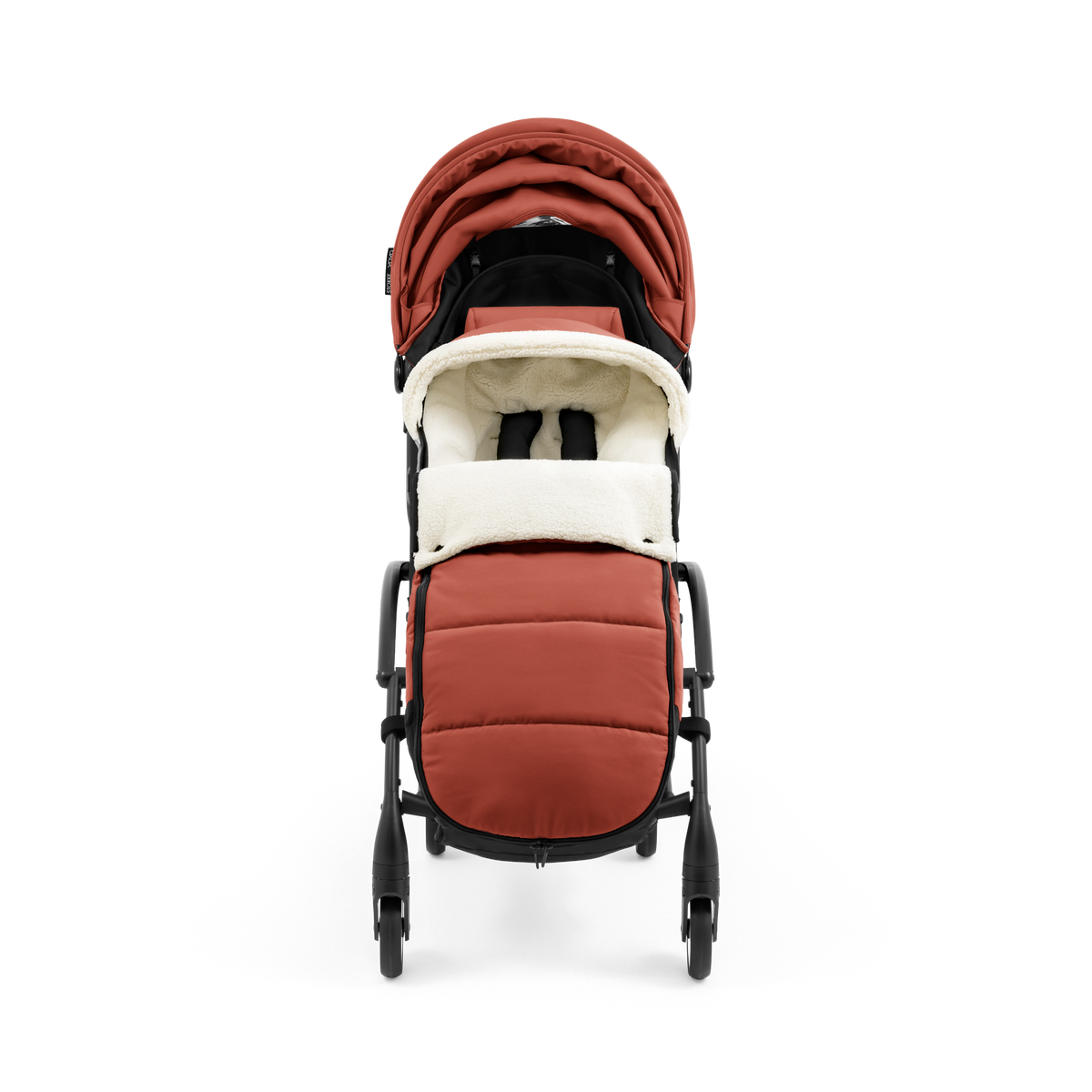 A stroller with a rust-colored padded footmuff, cream fleece lining, and a black frame, shown from the front on a white background.