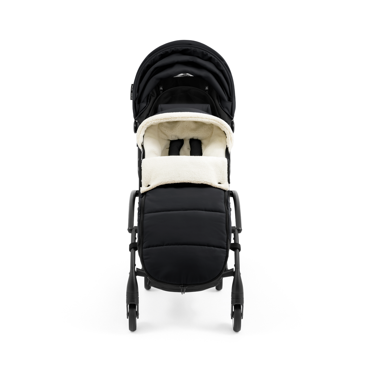 A stroller with a black colored padded footmuff, cream fleece lining, and a black frame, shown from the front on a white background.