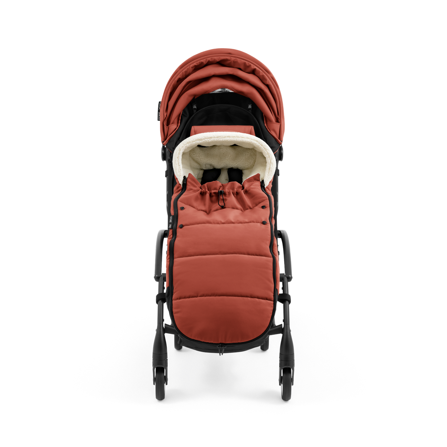 A stroller with a rust-colored padded footmuff, cream fleece lining, and a black frame, shown from the front on a white background.